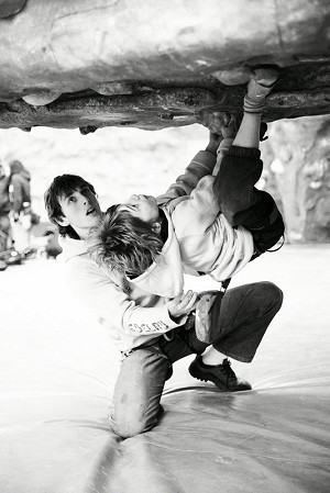 A 'wee kid' in action, here strong Leo puts in the effort on the boulders.   © Will Carroll