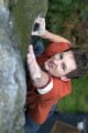 Ru Davies finds he has to pull quite hard on the Pinch at Caley crags, V5.