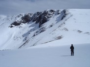 Looking back to Cairn Lochan in Cairn Gorms on Bank Holiday Weekend. You can see avalanche debris on 'The Great Slab'.
