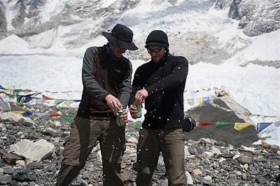 Kenton Cool and cameraman Keith Partridge celebrating the '8848 Likes' with a beer at Everest base camp  © BMC Collection