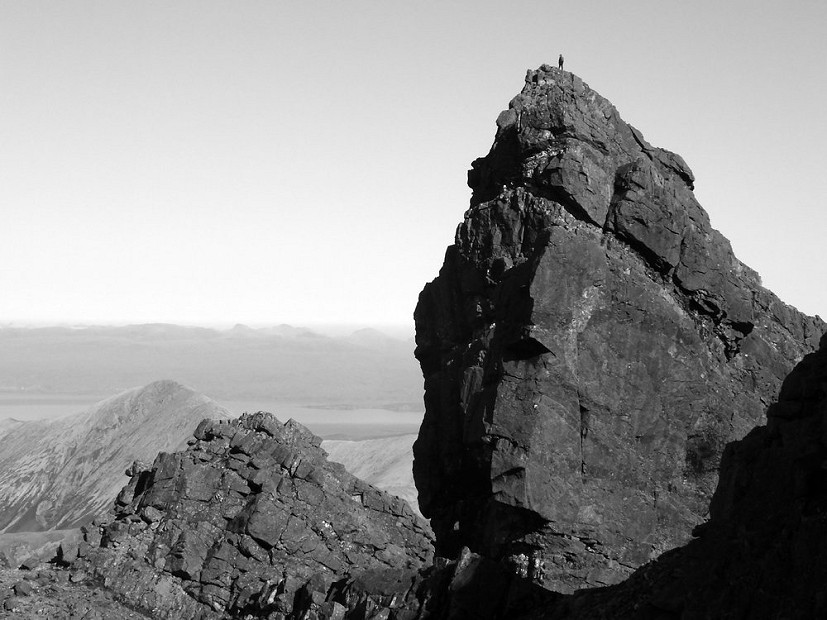 A lone climber on the summit of Am Basteir  © JamesRoddie