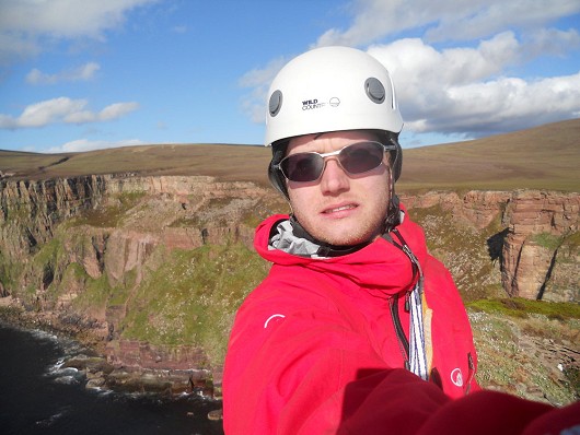 Me at the top of the Old Man of Hoy, more grimace than smile reflecting my feelings :-)  © Puppythedog