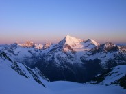 East view of Weisshorn at sunrise from NW flank of the Dom.