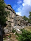 Topping out Right-Hand Crack on a sunny day at Brimham