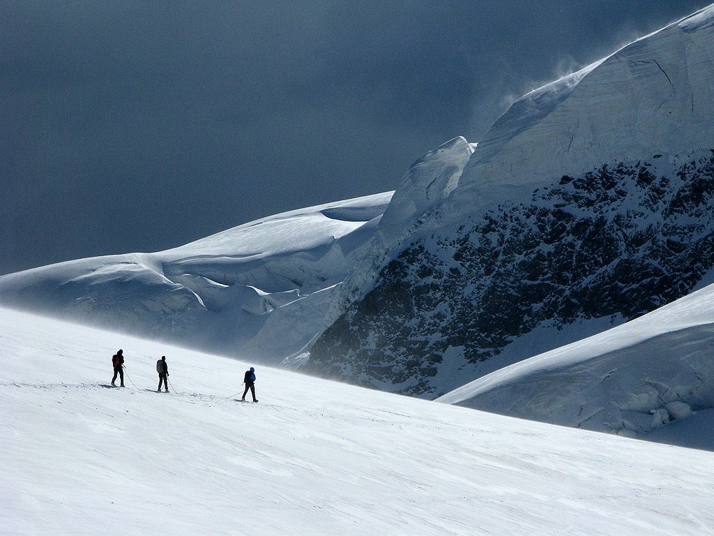 Climbers on Cresta Guzza pass heading towards Bellavista terraces at Rhaetian Alps - Bernina group.  © Crankn