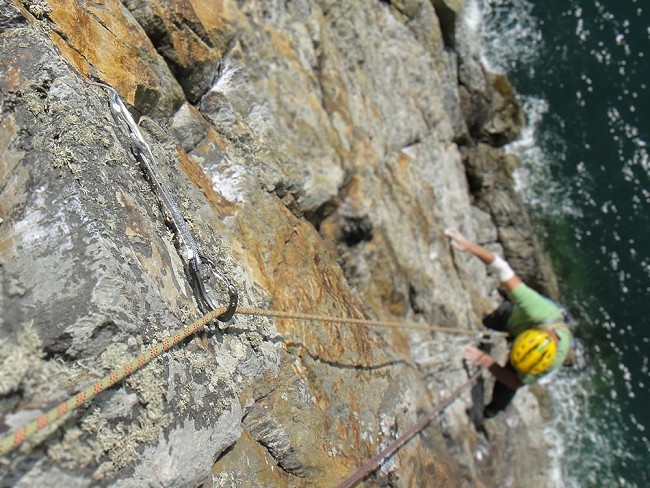 Pete Johnson following Eraserhead (E5, Gogarth Main Cliff) showing Alpha Trad in use during testing  © Steve Long