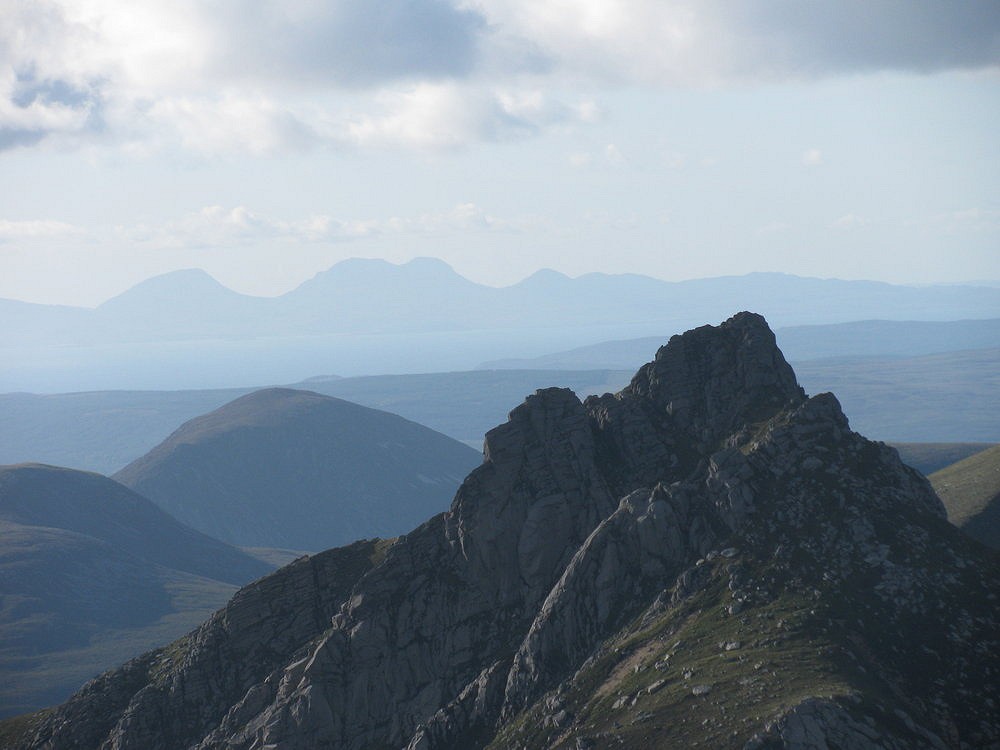 Cir Mhor, Meall nan Damh, Kintyre and the mountains of Jura from Goat Fell  © Yrmenlaf