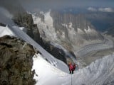 High on the Rochefort Ridge with the Chamonix Aiguilles and Mer de Glace below<br>© Robin Beadle