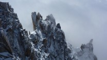The first climbers on Cosmique Arete after the storms