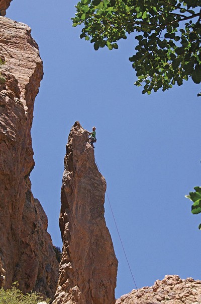 Paul Donnithorne seconding the FA of Well Posed, E3 5c, The Deep Well Pinnacles, Ida       Ougnidif Area  © Don Sargeant