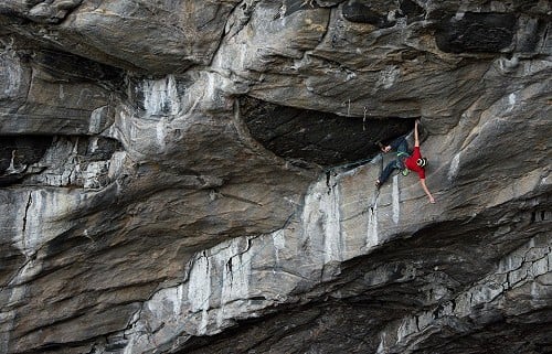 Adam Ondra onsighting Odin's eye, 8c+, Hanshelleren cave, Flatanger, Norway  © Petr Pavlicek