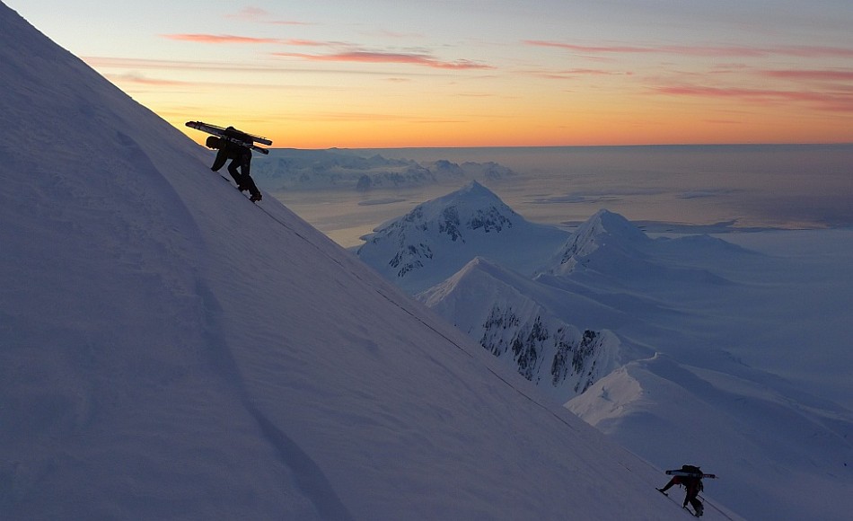 Ascending Mt Agamemnon at sunset, Anvers Island. Mt William and Lemaire Channel area behind  © Dave
