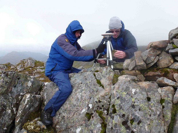Graham Jackson and John Barnard setting up on the summit of Sgurr a' Bhac Chaolais  © Andy Nisbet