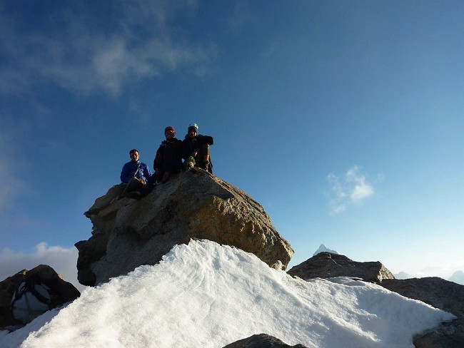 The summit of Pik 4810, from left to right: Ian Faulkner, Tom Codrington and Ian Cooper.  © Ian Faulkner