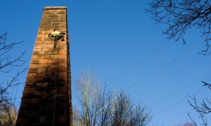 It doesn't get much more urban than this! Climbing into the sun on the old viaduct towers of Blantyre, Arrol's Arete (6b)  © Topher Dagg and Sebastien Rider