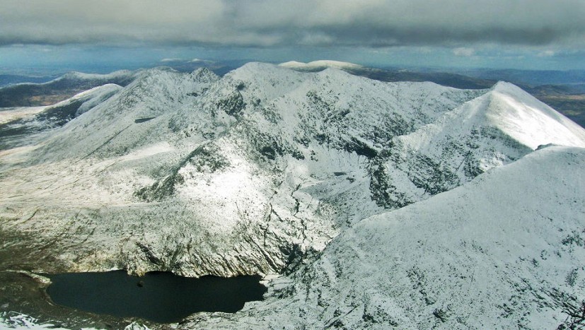 The MacGillycuddy’s Reeks in winter, seen from the top of Carrauntoohil   © Adrian Hendroff