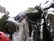Squirming my way up a small ice fall in Wilderness Gully.