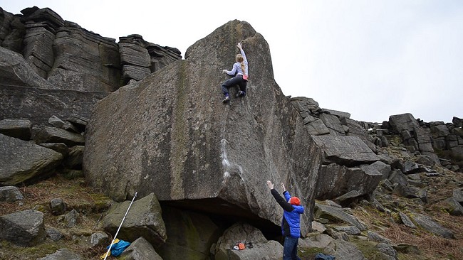 Mina Leslie-Wujastyk making the first female ascent of Careless Torque (8A) at Stanage  © Nick Brown / Outcrop Films (Screen shot from video)