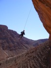abseiling after climb on 7c, Todra, Morroco