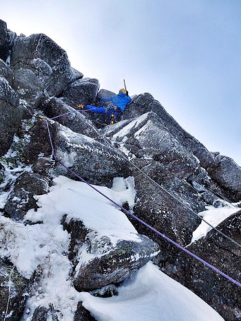 Greg Boswell pulling through the roof on pitch two of Mort.  © Nick Bullock
