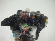 Standing atop Ben Nevis in Whiteout with Joe Hallam, Josh Lee, Tom Jeffery, Lewis Oliver, and Myself.