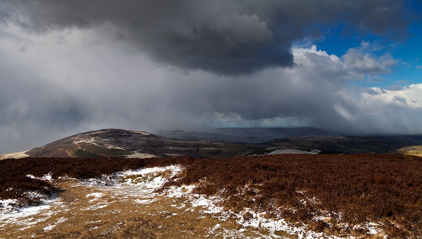 Snow showers on the Clwyds, looking north from Moel Arthur  © David Dear