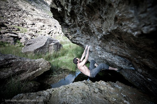 Henry Griffiths on the bog traverse, cromlech boulders  © lonetree photography