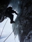 Back and footing out of the cave onto the crux ice pillar of Minus three gully....a strenuous move!
