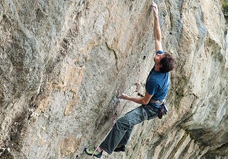 Pete Robins attempting what became his new route Pump Up The Jam (8c) Pigeon's Cave, North Wales.  © Jack Geldard -  UKC Chief Editor