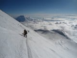 Descending the "Autobahn" above 17,200 ft camp on Denali after summiting in fantastic weather<br>© Matt Knox