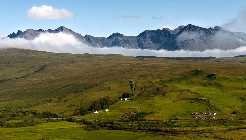 The Main Ridge appears through the clouds.  © Sean Kelly