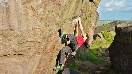 Powering through the crux on "Nadin's Traverse" (V7 6c) at the Roaches Upper Tier boulders (video still)  © PeteWilson
