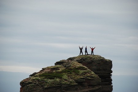 The Blind Man of Hoy - the triumphant three celebrate on the summit  © Keith Partridge