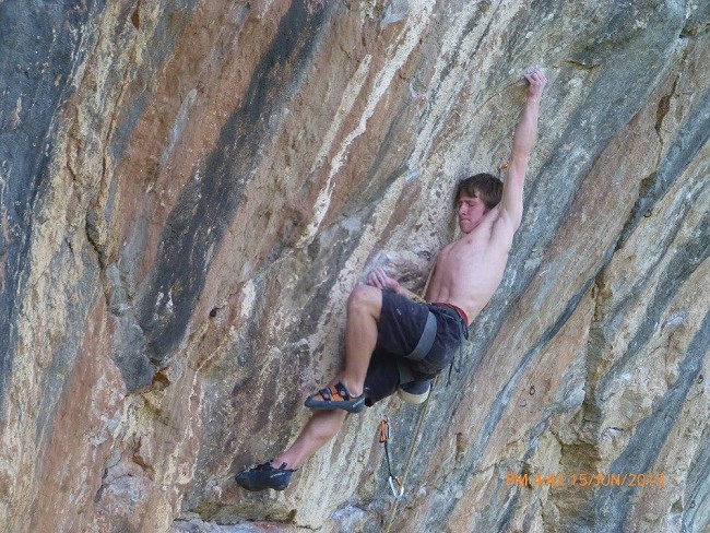 Peter Dawson working the moves on Tuppence, 8a+/b  © Peter Dawson Collection