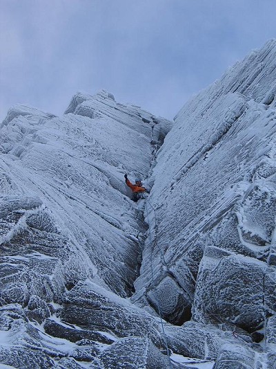 Erick leading his first Grade V, Savage Slit, Coire an Lochan, Northern Corries V,6.  © Nik Harries