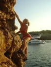Emma deep water soloing in Mallorca