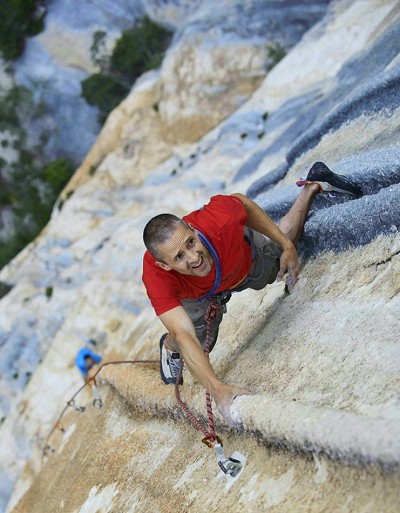 Steve McClure showing the strain of flashing a big endurance pitch with a storm approaching  © Tim Glasby