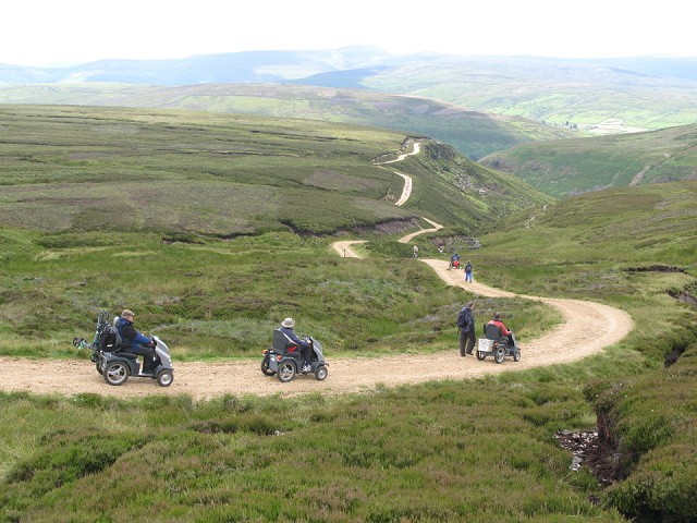 Electric scooter users in Swaledale  © YDNPA