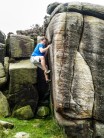 Going for a sort of dyno move on the bouldering problem Friend Slot Wall I think, (If im wrong please correct me)
