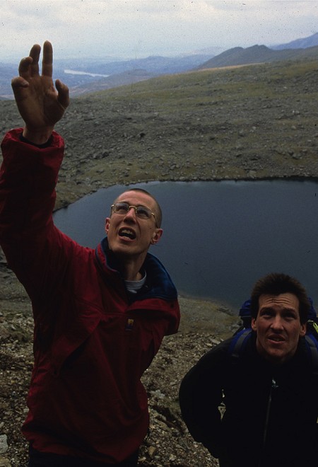 Neil Gresham and Johnny Dawes discuss Indian Face at the base of the cliff  © Mike Goldwater