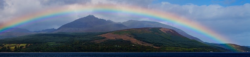 Rainbow Island.  Goatfell framed by a rainbow from the ferry to Brodick.  © David Dear