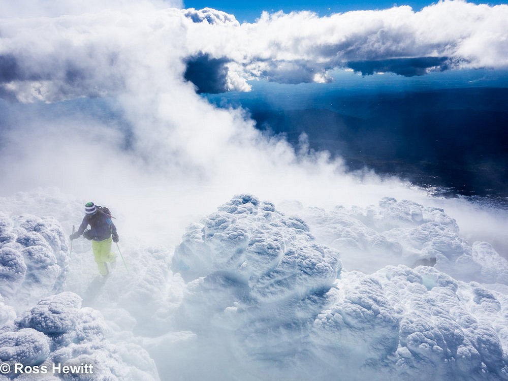 Michelle Blaydon near the rim of volcano Llaima  © Ross Hewitt