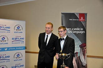 Sir Chris Hoy presenting William with the Miquel Trophy  © Bosi Collection