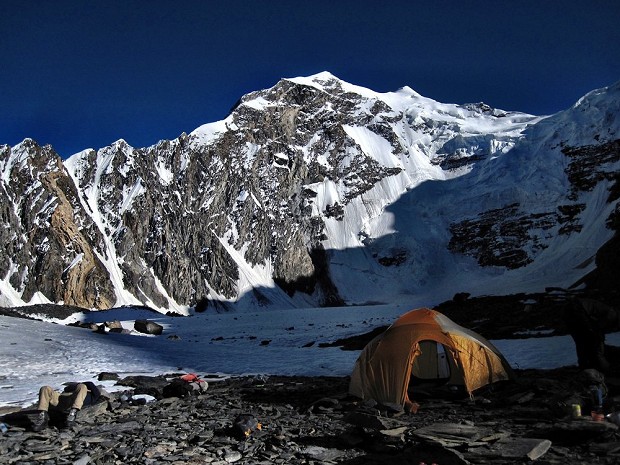 Base Camp, 4800m. Koh e Qara Jilga summit lies at the snowy tip beyond the face.  © Rich Parker
