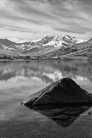 A rock, a lake and snowdon