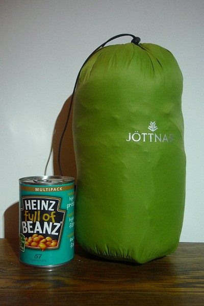 The Jottnar Fjorm Down Jacket next to a tin of beans for size comparison  © Emily Andrew Collection