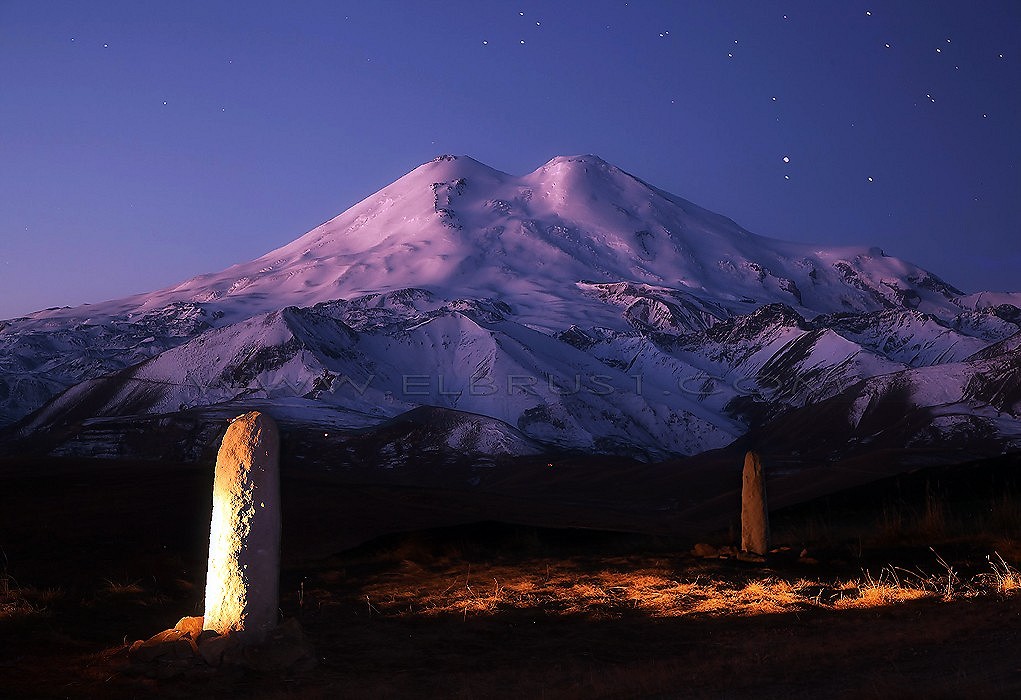 Mt. Elbrus from the north with 2 Mengirs in sun rise.  © VladimirKopylov