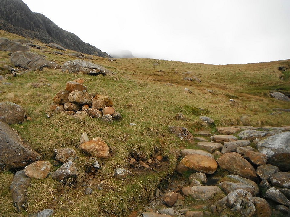 Cairn at Rossett Ghyll, destroyed and thrown on the path  © NT Fell Rangers