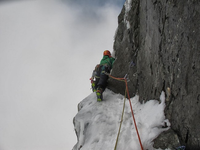 Adam Hughes climbing poorly protected ice on pitch 2 of Orient Express, Ben Nevis  © Dave Macleod