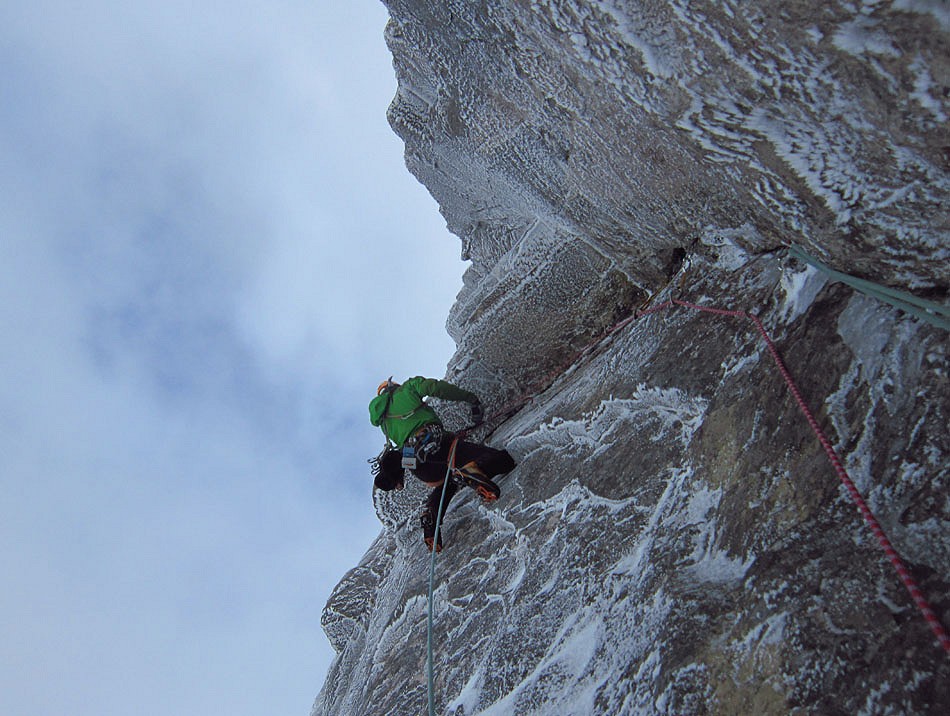 Murdoch on the strenuous traverse on pitch 3 of The Route of All Evil, Beinn Eighe  © John Orr